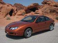 Funky orange Pontiac Sunfire